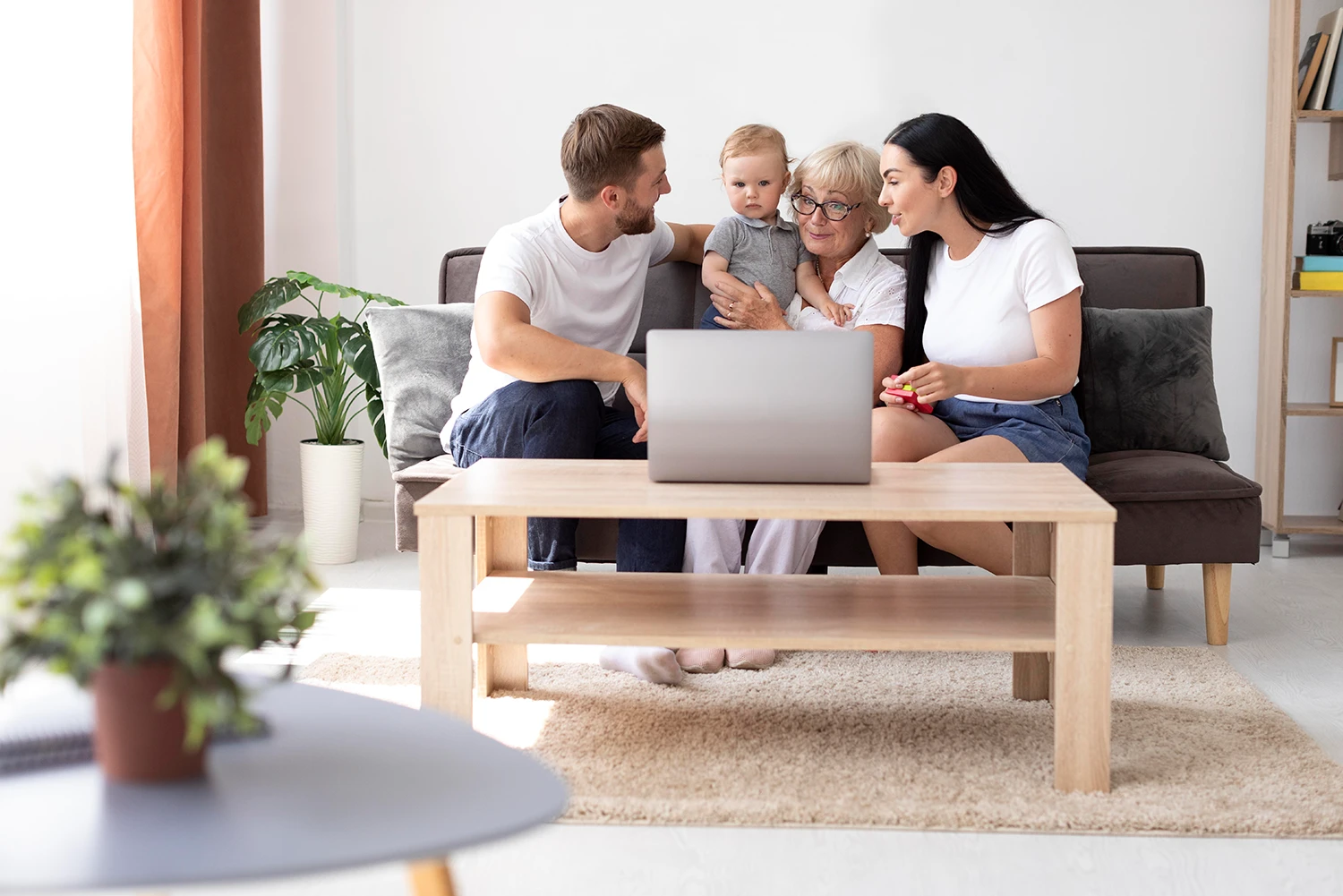 family sitting on the sofa