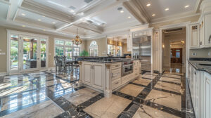 Luxury kitchen with high ceilings and stone floors